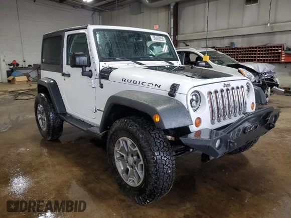 2013 Jeep Wrangler Rubicon 10th Anniversary z VIN 1C4BJWCGXDL543958, wystawiony jako Copart lot #58492255 z przebiegiem 94 455 mil mil oraz Szkoda całkowita • Salvage title. Historia ofert i sprzedaży dostępna na DreamBid. Obrazek 4.