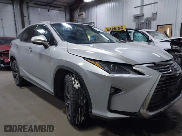 2017 Lexus RX with VIN 2T2BZMCAXHC067275, listed as a IAAI auction lot 41386504 with 100,477 mi miles. Bid and sale history available at carsss.com. Image 1.