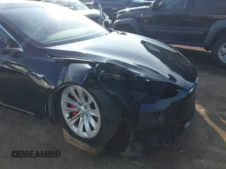 2018 Tesla Model S 75D with VIN 5YJSA1E45JF269282, listed as a IAAI auction lot 42404695 with 251,795 mi miles and . Bid and sale history available at DreamBid. Image 6.
