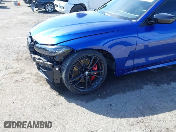 2024 BMW 4 Series M440i with VIN WBA53AT0XRCP39898, listed as a IAAI auction lot 41583884 with 2,212 mi miles and . Bid and sale history available at carsss.com. Image 20.