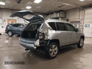 2016 Jeep Compass Latitude with VIN 1C4NJDEB4GD631759, listed as a IAAI auction lot 42193660 with 100,659 mi miles and . Bid and sale history available at DreamBid. Image 4.