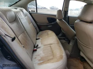 2000 Chevrolet Malibu LS with VIN 1G1NE52J5Y6350025, listed as a Copart auction lot 73934584 with 103,781 mi miles and Salvage Title. Bid and sale history available at carsss.com. Image 11.