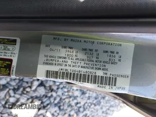 2011 Mazda Mazda3 i Sport with VIN JM1BL1UG4B1480828, listed as a IAAI auction lot 41868170 with 136,876 mi miles. Bid and sale history available at carsss.com. Image 9.
