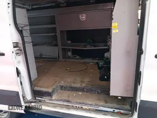 2015 Ford Transit Cargo with VIN 1FTNE1YM4FKA87516, listed as a IAAI auction lot 42901216 with 269,921 mi miles and . Bid and sale history available at DreamBid. Image 3.