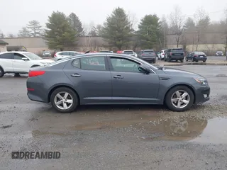 2015 Kia Optima LX with VIN KNAGM4A73F5625605, listed as a IAAI auction lot 41924411 with 104,153 mi miles. Bid and sale history available at carsss.com. Image 13.