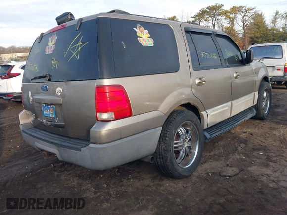 2003 Ford Expedition XLT Value with VIN 1FMPU16W83LA58988, listed as a IAAI auction lot 41627386 with 999,999 mi miles. Bid and sale history available at carsss.com. Image 4.
