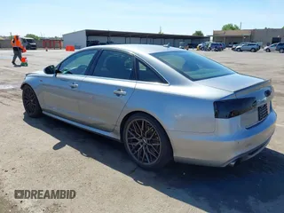 2013 Audi A6 Prestige z VIN WAUJGAFC2DN088630, wystawiony jako IAAI lot #42272569 z przebiegiem 110 324 mil mil oraz . Historia ofert i sprzedaży dostępna na DreamBid. Obrazek 3.