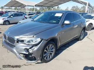 2015 BMW X6 xDrive50i with VIN 5UXKU6C52F0F94060, listed as a IAAI auction lot 41299202 with 67,835 mi miles. Bid and sale history available at carsss.com. Image 17.