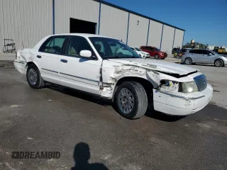 2003 Mercury Grand Marquis GS Convenience z VIN 2MEFM74W13X607924, wystawiony jako Copart lot #48960815 z przebiegiem 141 975 mil mil oraz Szkody całkowita. Historia ofert i sprzedaży dostępna na DreamBid. Obrazek 4.