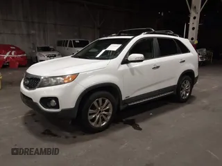 2011 Kia Sorento EX with VIN 5XYKUDA2XBG136475, listed as a IAAI auction lot 41795452 with 218,041 mi miles. Bid and sale history available at carsss.com. Image 2.