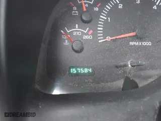 1999 Dodge Ram 1500 with VIN 3B7HF13Z8XG140644, listed as a IAAI auction lot 41971280 with 157,584 mi miles. Bid and sale history available at carsss.com. Image 15.