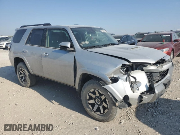 2023 Toyota 4Runner TRD Off Road Premium with VIN JTERU5JR3P6120898, listed as a Copart auction lot 46984915 with 49,525 mi miles and Salvage title. Bid and sale history available at DreamBid. Image 4.