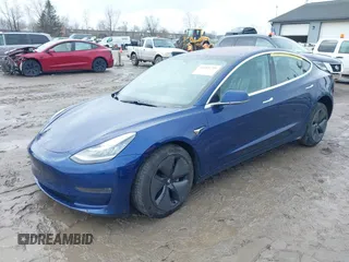 2018 Tesla Model 3 Long Range Battery with VIN 5YJ3E1EB4JF094496, listed as a IAAI auction lot 41983799 with 188,316 mi miles and . Bid and sale history available at DreamBid. Image 2.