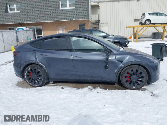2023 Tesla Model Y Performance with VIN 7SAYGDEF0PF898181, listed as a IAAI auction lot 41577666 with 19,051 mi miles and . Bid and sale history available at DreamBid. Image 13.
