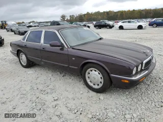 1998 Jaguar XJ with VIN SAJHX1240WC822861, listed as a Copart auction lot 79388654 with 120,568 mi miles and Non Repairable. Bid and sale history available at carsss.com. Image 4.