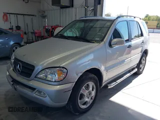 2002 Mercedes-Benz M-Class with VIN 4JGAB54E32A360356, listed as a IAAI auction lot 40540769 with 235,810 mi miles. Bid and sale history available at carsss.com. Image 2.