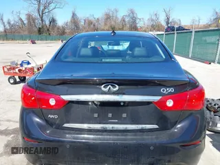 2015 Infiniti Q50 Premium z VIN JN1BV7AR2FM416586, wystawiony jako IAAI lot #41728760 z przebiegiem 138 446 mil mil oraz . Historia ofert i sprzedaży dostępna na DreamBid. Obrazek 17.