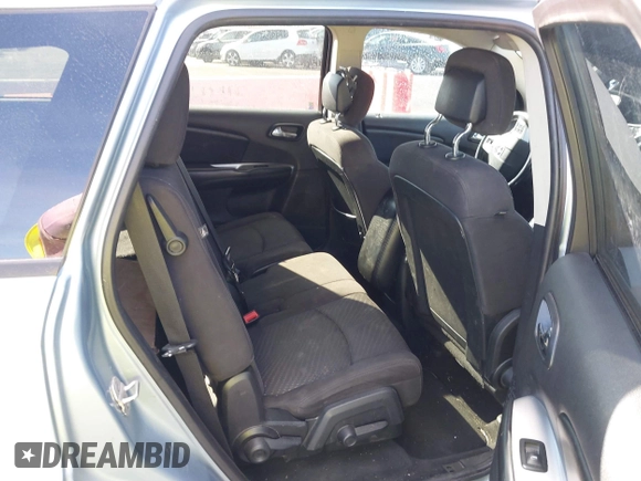 2013 Dodge Journey SXT with VIN 3C4PDCBG4DT584135, listed as a IAAI auction lot 41902149 with 165,700 mi miles and . Bid and sale history available at carsss.com. Image 8.