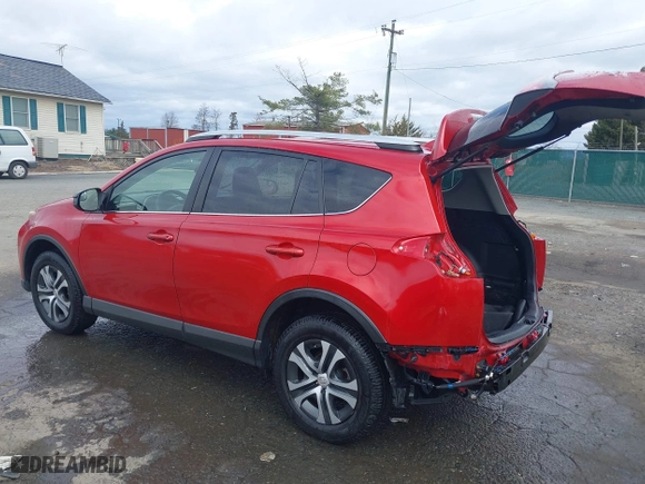 2016 Toyota RAV4 LE with VIN JTMBFREV2GJ097058, listed as a IAAI auction lot 41720372 with 118,606 mi miles. Bid and sale history available at carsss.com. Image 3.