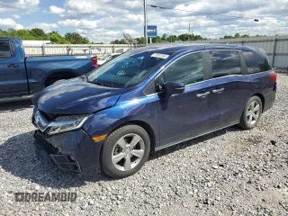 2018 Honda Odyssey EX with VIN 5FNRL6H58JB051850, listed as a Copart auction lot 55930065 with 154,259 mi miles and Salvage title. Bid and sale history available at DreamBid. Image 1.