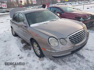 2008 Kia Amanti with VIN KNALD125685144535, listed as a IAAI auction lot 41681582 with 158,560 mi miles. Bid and sale history available at carsss.com. Image 1.