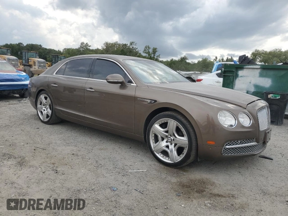 2014 Bentley Flying Spur с VIN SCBEC9ZA9EC091162, выставлен на аукционе Copart как лот 55941855 с пробегом 135 032 миль миль и Списание • Salvage title. История ставок и продаж доступна на DreamBid. Изображение 4.
