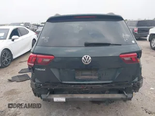 2019 Volkswagen Tiguan S with VIN 3VV1B7AXXKM002312, listed as a IAAI auction lot 42282809 with 80,781 mi miles and . Bid and sale history available at DreamBid. Image 16.