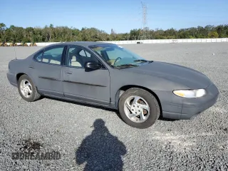 1997 Pontiac Grand Prix SE with VIN 1G2WJ52K5VF263791, listed as a Copart auction lot 78865814 with 134,430 mi miles and Salvage Title. Bid and sale history available at carsss.com. Image 4.