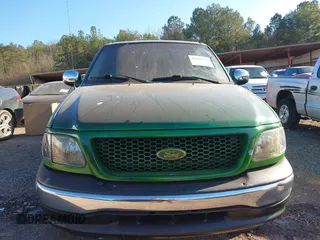 2001 Ford F-150 XL with VIN 2FTRX07WX1CA79197, listed as a IAAI auction lot 41655618 with 267,846 mi miles. Bid and sale history available at carsss.com. Image 6.