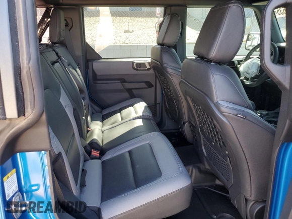 2024 Ford Bronco Big Bend z VIN 1FMDE7BH9RLB50114, wystawiony jako Copart lot #52157635 z przebiegiem 1 002 mil mil oraz Szkoda całkowita • Salvage title. Historia ofert i sprzedaży dostępna na DreamBid. Obrazek 12.