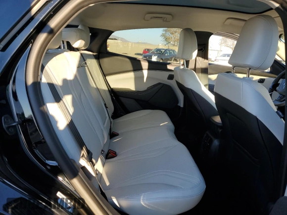 2024 Ford Mustang Mach-E Premium with VIN 3FMTK3R45RMA23195, listed as a Copart auction lot 46356045 with 889 mi miles and Salvage Title. Bid and sale history available at DreamBid. Image 11.