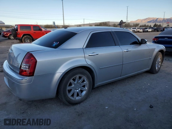 2006 Chrysler 300 C with VIN 2C3KA63H36H480201, listed as a Copart auction lot 44947715 with 145,831 mi miles and Salvage Title. Bid and sale history available at carsss.com. Image 3.