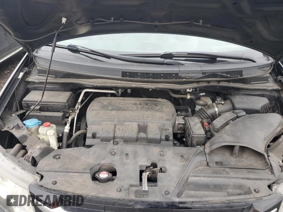 2014 Honda Odyssey Touring с VIN 5FNRL5H9XEB056180, выставлен на аукционе Copart как лот 47781575 с пробегом 142 707 миль миль и Списание • Salvage title. История ставок и продаж доступна на DreamBid. Изображение 13.