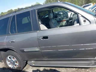 2005 GMC Envoy SLE with VIN 1GKDS13S452306939, listed as a IAAI auction lot 41931667 with 236,955 mi miles. Bid and sale history available at carsss.com. Image 14.