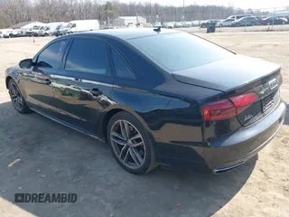 2017 Audi A8 with VIN WAU44AFDXHN004395, listed as a IAAI auction lot 41705688 with 63,282 mi miles and . Bid and sale history available at DreamBid. Image 3.