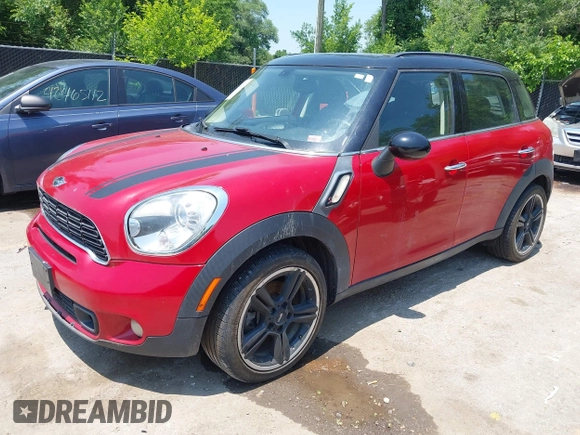 2013 MINI Countryman S with VIN WMWZC3C58DWP24865, listed as a IAAI auction lot 42386463 with 100,612 mi miles and . Bid and sale history available at DreamBid. Image 2.