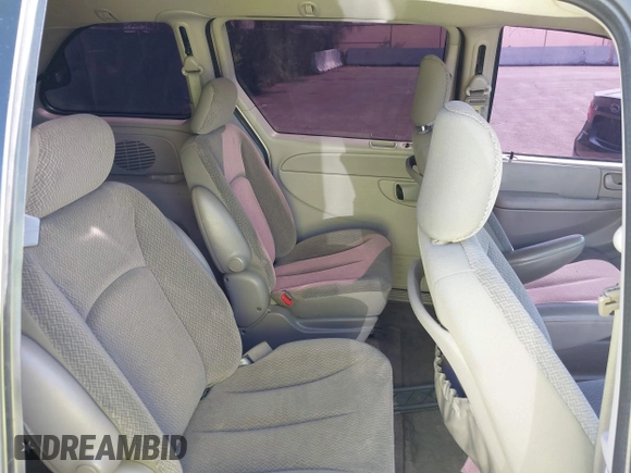 2005 Dodge Caravan SXT with VIN 1D4GP45R35B160641, listed as a IAAI auction lot 42132099 with 196,731 mi miles and . Bid and sale history available at carsss.com. Image 8.