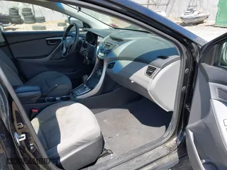 2013 Hyundai Elantra GLS with VIN 5NPDH4AE2DH450608, listed as a IAAI auction lot 41932150 with 188,509 mi miles. Bid and sale history available at carsss.com. Image 5.