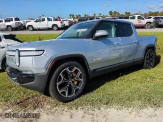 2023 Rivian R1T Adventure with VIN 7FCTGAAA5PN019317, listed as a Copart auction lot 74416784 with 11,508 mi miles and Salvage Title. Bid and sale history available at carsss.com. Image 1.