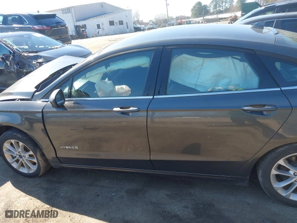 2019 Ford Fusion Hybrid SE with VIN 3FA6P0LU1KR235021, listed as a IAAI auction lot 41660786 with 93,331 mi miles. Bid and sale history available at carsss.com. Image 14.