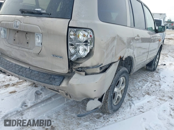 2006 Honda Pilot EX-L with VIN 2HKYF18526H546575, listed as a IAAI auction lot 41414263 with 118,872 mi miles and . Bid and sale history available at DreamBid. Image 12.