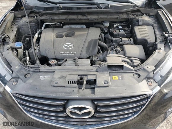 2016 Mazda CX-5 Touring with VIN JM3KE4CY7G0860868, listed as a Copart auction lot 51203415 with 86,768 mi miles and Salvage Title. Bid and sale history available at carsss.com. Image 13.
