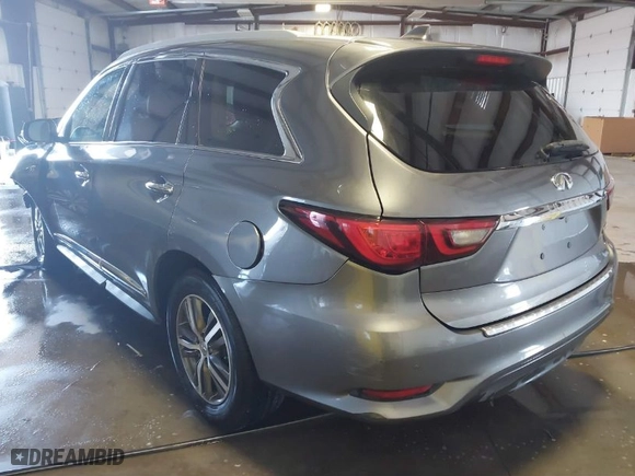 2019 Infiniti QX60 LUXE with VIN 5N1DL0MN0KC518816, listed as a IAAI auction lot 41614942 with 75,548 mi miles. Bid and sale history available at carsss.com. Image 3.