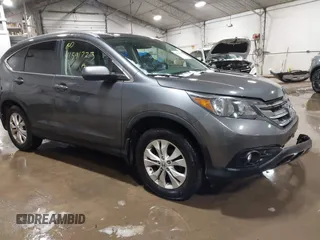2013 Honda CR-V EX-L z VIN 2HKRM4H77DH610894, wystawiony jako IAAI lot #41591723 z przebiegiem 92 662 mil mil oraz . Historia ofert i sprzedaży dostępna na DreamBid. Obrazek 1.