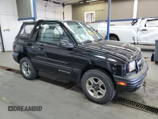 2002 Chevrolet Tracker with VIN 2CNBJ18CX26906088, listed as a Copart auction lot 79519944 with 111,342 mi miles and Salvage title. Bid and sale history available at DreamBid. Image 4.