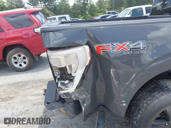 2021 Ford F-150 XL with VIN 1FTFW1E8XMFC04210, listed as a IAAI auction lot 42493373 with 99,181 mi miles and . Bid and sale history available at DreamBid. Image 18.