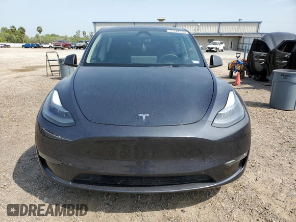 2024 Tesla Model Y Long Range z VIN 7SAYGDEE3RA234223, wystawiony jako Copart lot #51784185 z przebiegiem 24 257 mil mil oraz Szkoda całkowita • Salvage title. Historia ofert i sprzedaży dostępna na DreamBid. Obrazek 5.