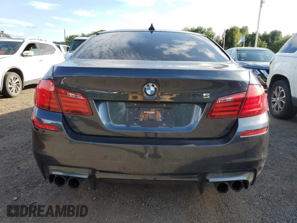2013 BMW M5 with VIN WBSFV9C5XDD096847, listed as a Copart auction lot 69652454 with 73,632 mi miles and Clean Title. Bid and sale history available at carsss.com. Image 6.