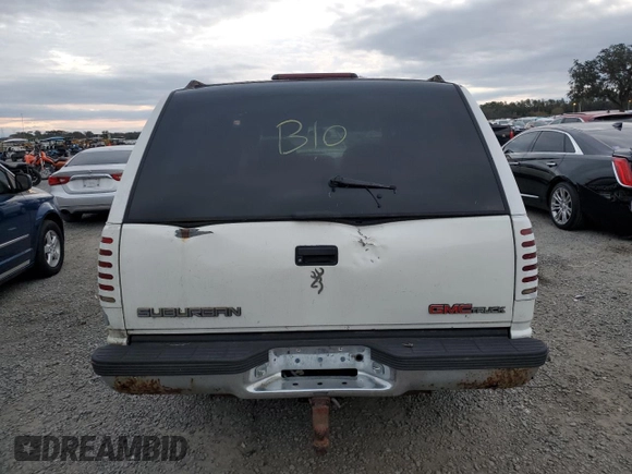 1995 GMC Suburban z VIN 1GKFK16K3SJ704911, wystawiony jako Copart lot #88326825 z przebiegiem 191 006 mil mil oraz Szkoda całkowita • Salvage title. Historia ofert i sprzedaży dostępna na DreamBid. Obrazek 6.