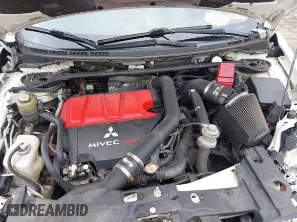 2013 Mitsubishi Lancer Evolution GSR z VIN JA32W8FV0DU023509, wystawiony jako IAAI lot #42222552 z przebiegiem 128 030 mil mil oraz . Historia ofert i sprzedaży dostępna na DreamBid. Obrazek 10.